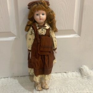 Vintage 90s porcelain doll Auburn ringlets blue eyes cloth body dressed mint